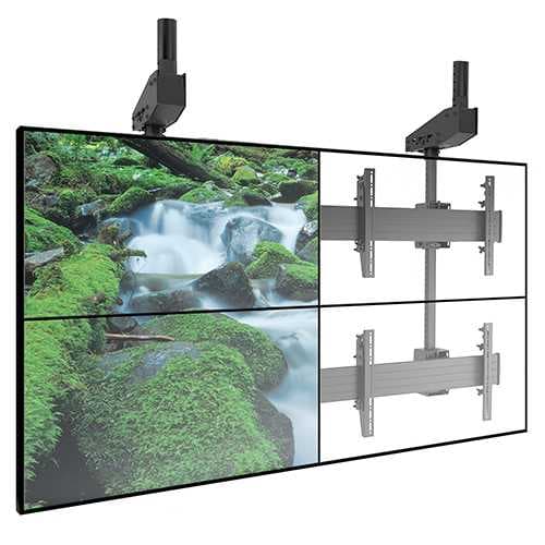 Chief LCM2X2U Fusion ceiling video wall mount holding four landscape displays in a 2x2 array from two ceiling columns; the two left-hand panels show a photographic image and the right-hand pair are shown as outlines to reveal the rails and interface brackets behind.